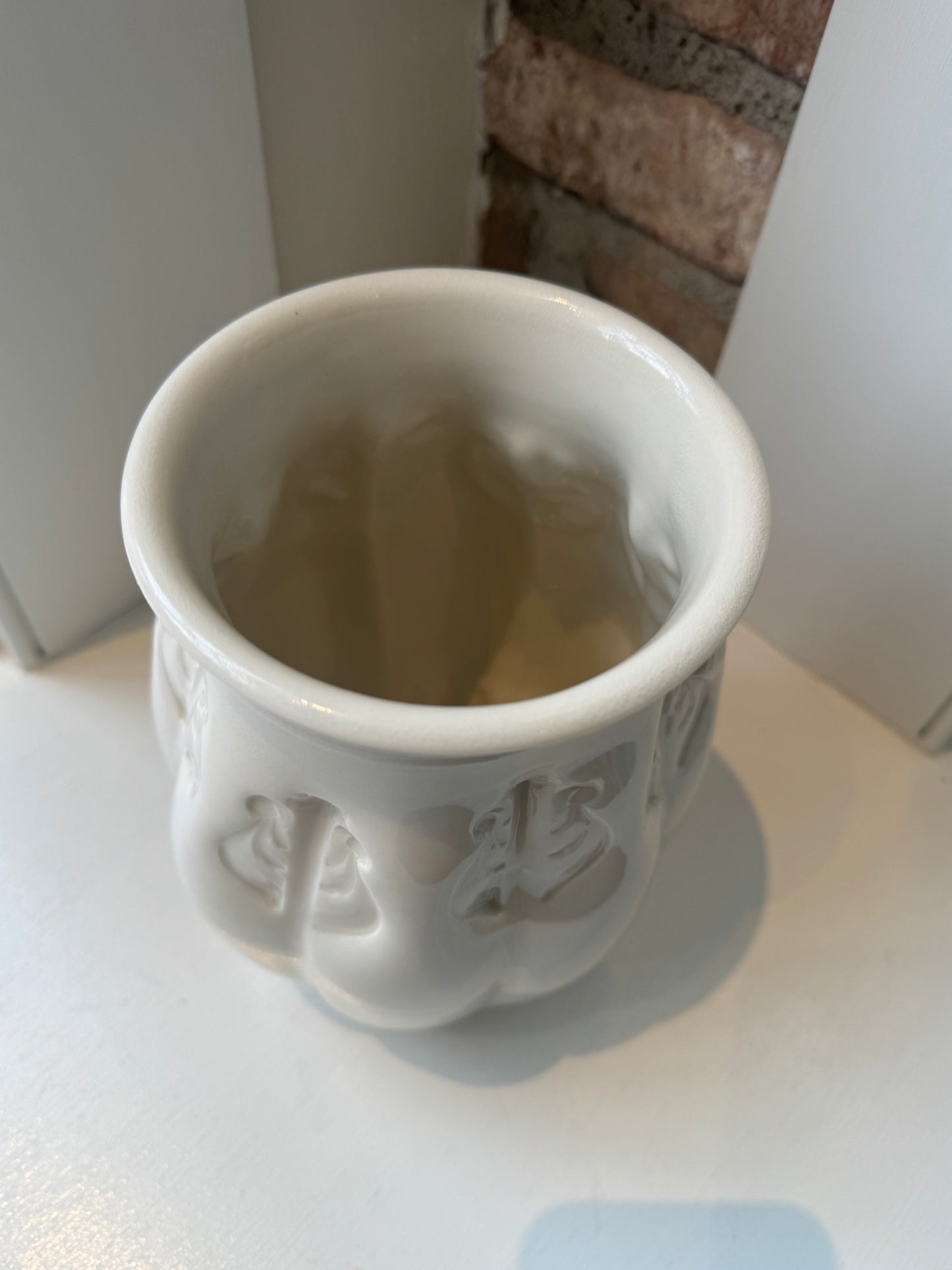 Tall Curved Stamped Vase